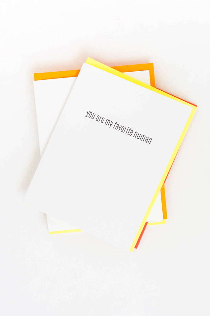 Notebook with 'you are my favorite human' text on a white background