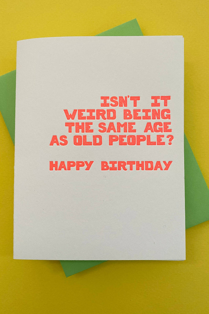 Birthday card with humorous text on a yellow background  weird being the same age as old people