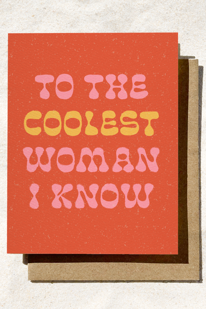 Greeting card with 'To the Coolest Woman I Know' text on a textured red background