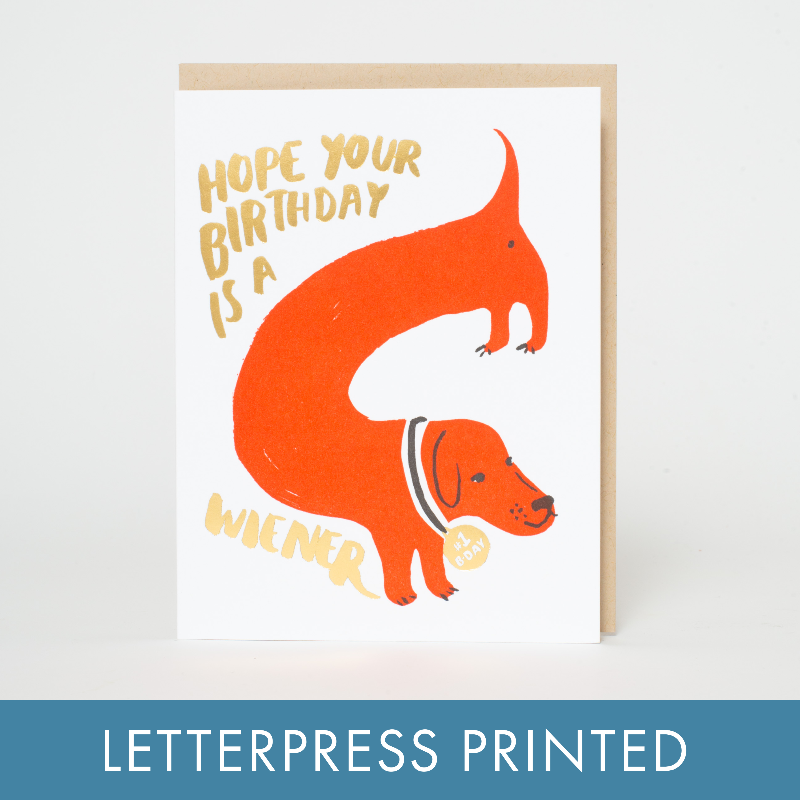 Greeting card with orange dachshund illustration and text 'Hope your birthday is a wiener' on a white background.