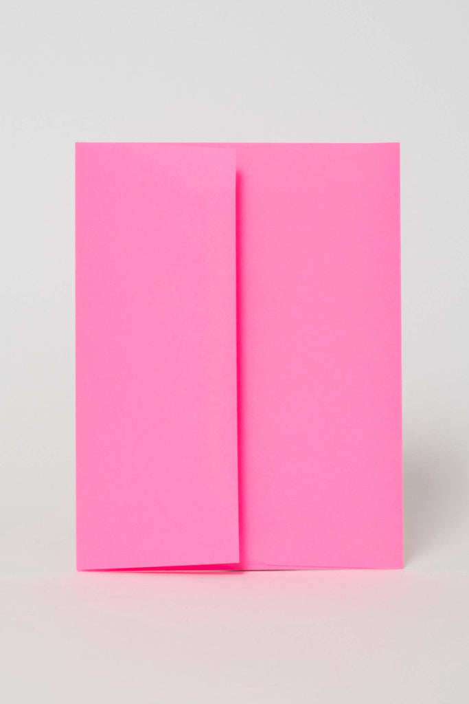 Pink envelope on a light gray background