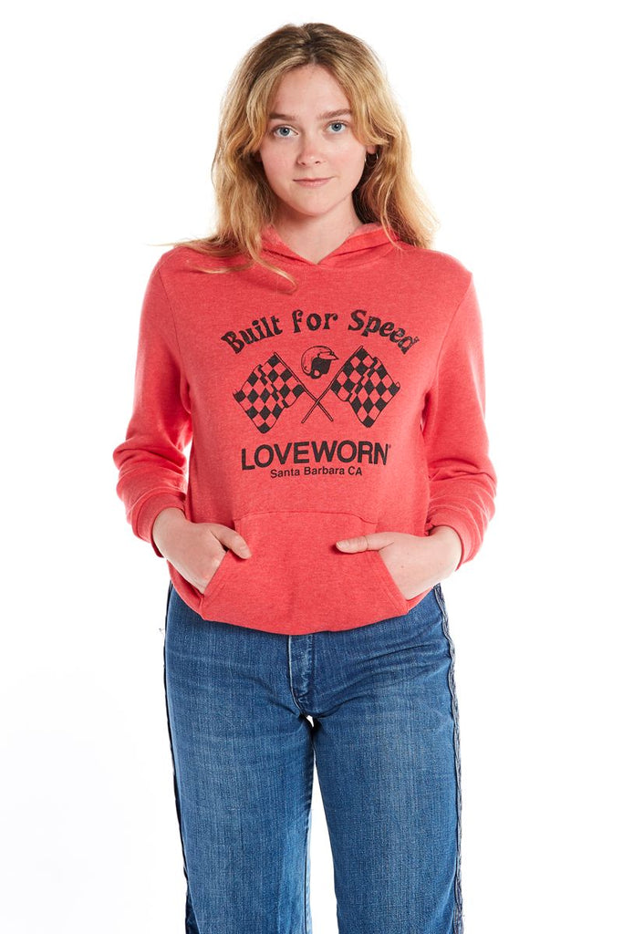 red long sleeve pullover fleece hoodie with built for speed silkscreen and blue denim jeans