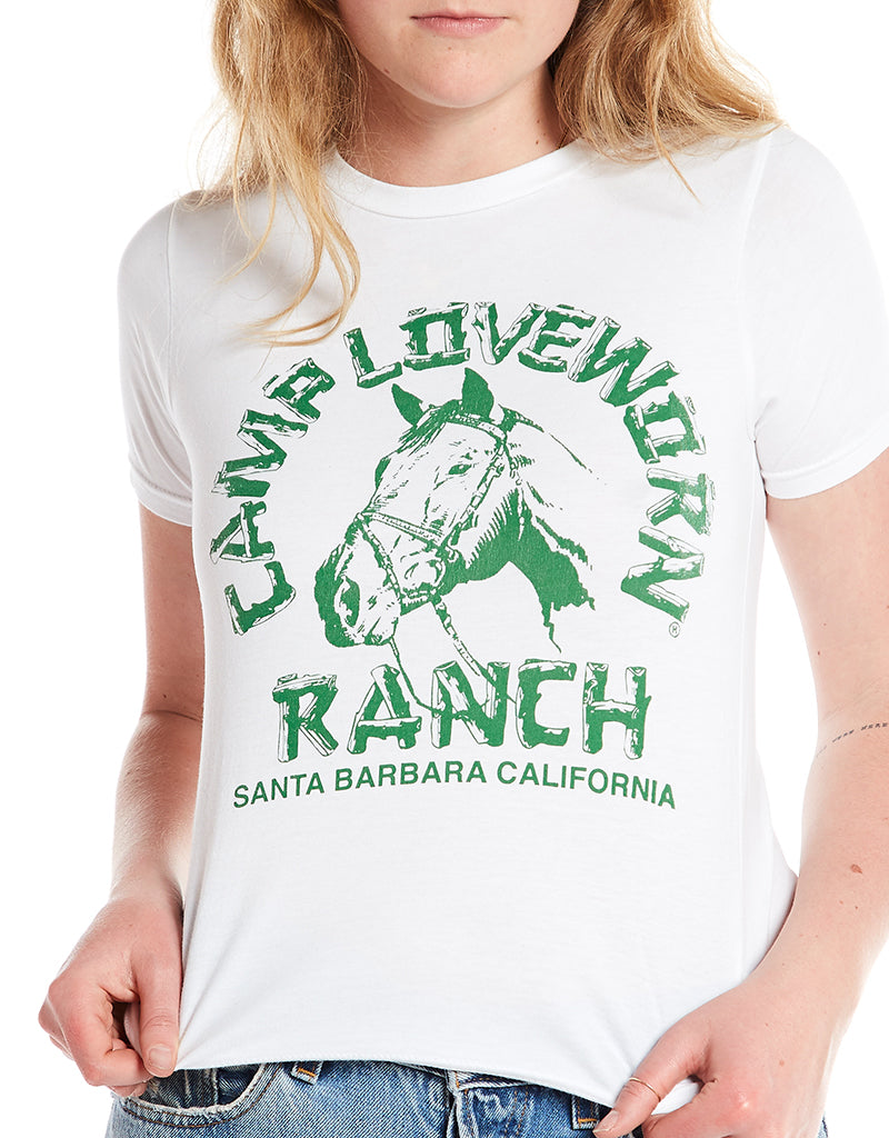 close up of youth crew neck short sleeve cotton tee shirt with camp loveworn ranch and horse logo hand silk-screened. work with vintage USA made levis button fly 501s